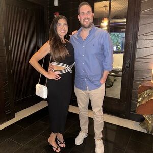 Lulu's Chic Black Midi Dress with White Accents